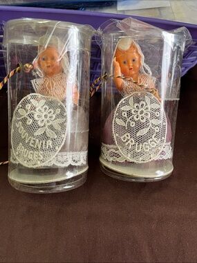 Antique purple and white lace souvenir doll pair by Antique